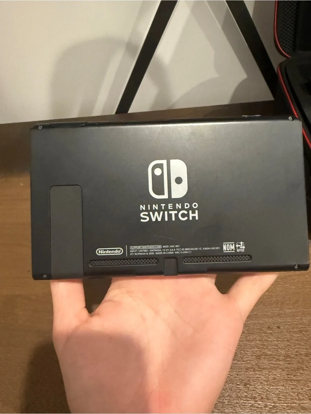 Nintendo Switch Console with Black Dock and Black Case Trimmed in Red